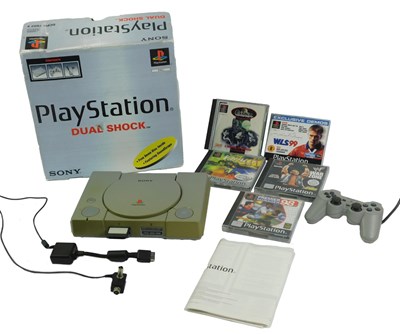 Lot 417 - A Sony PlayStation, with Dual Shock, boxed.