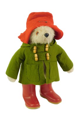 Lot 423 - A vintage Paddington Bear, wearing a red...