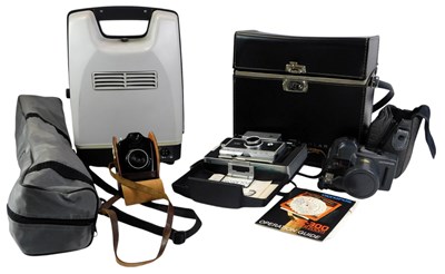 Lot 429 - A Polaroid Automatic 250 land camera,...