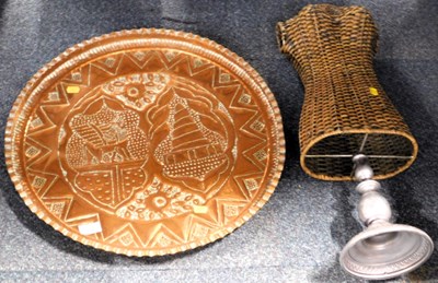 Lot 2092 - A large brass copper charger, with embossed...