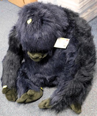 Lot 2096 - A large stuffed toy gorilla.