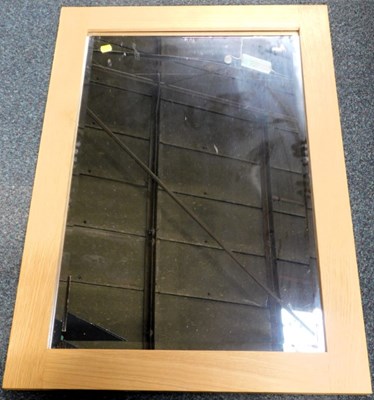 Lot 2104 - A rectangular wooden framed bevelled...