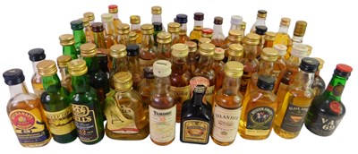 Lot 571 - A group of whisky miniatures, including Bells...
