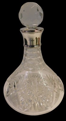 Lot 573 - An Elizabeth II silver collared cut glass...