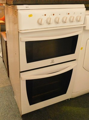 Lot 1017 - An Indesit oven, with ceramic hob.
