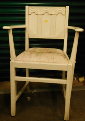 Lot 1062 - A white-painted armchair, with panel back,...