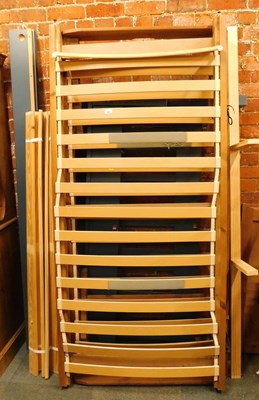 Lot 1024 - Two single pine bed frames, with side rails,...