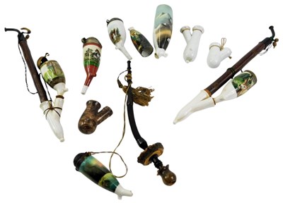 Lot 546 - A group of German ceramic pipes, mainly...