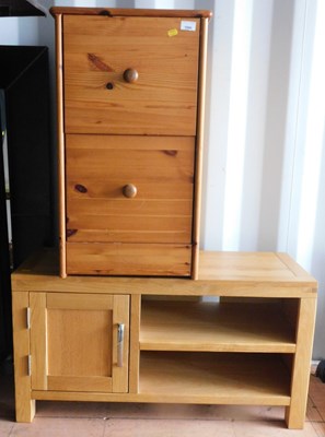 Lot 1066 - A chest of two drawers, and a light oak...