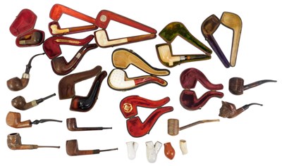 Lot 552 - A group of pipes, including carved wooden...