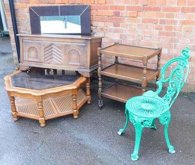 Lot 1068 - An octagonal glass-topped coffee table, with a...