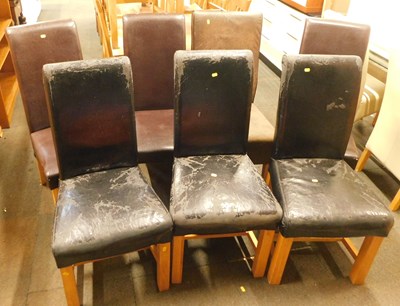 Lot 1038 - A set of seven dining chairs, with leatherette...
