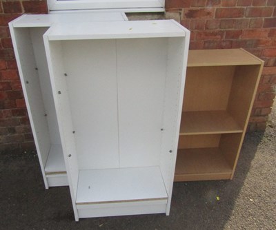 Lot 1056 - A pair of white melamine bookcases, 15cm high,...
