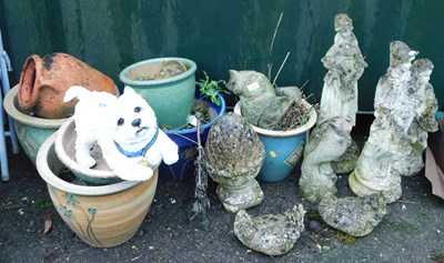 Lot 1076 - Garden statues and planters, including dog,...