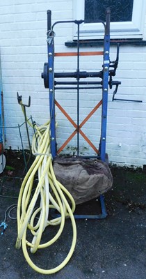 Lot 1079 - A metal framed sack barrow, hosing, etc. (a...