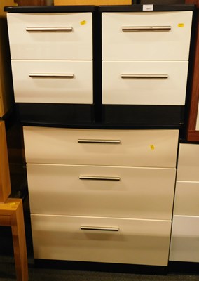 Lot 1043 - A pair of bedside two drawer chests, 51cm high,...
