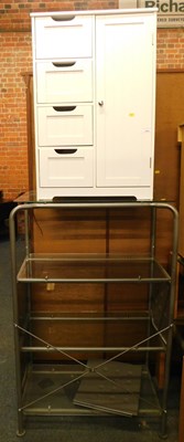 Lot 1045 - A white finished bedroom storage unit, with...