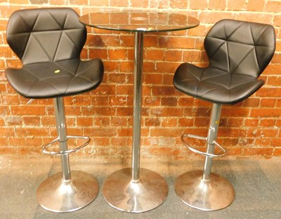 Lot 1046 - A chrome finished and leatherette topped bar...