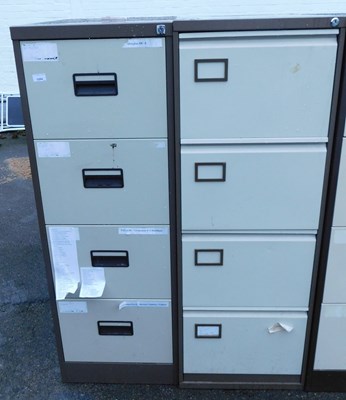 Lot 1084 - A pair of four-drawer metal filing...