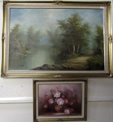 Lot 2197 - C. Inness. River scene through woodland, oil...