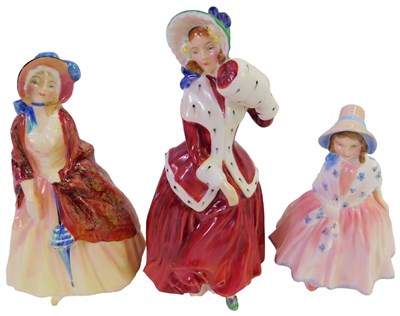 Lot 597 - Three Royal Doulton figures, comprising...