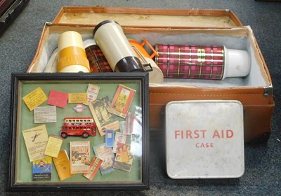 Lot 2114a - A suitcase, containing Thermos flasks, etc.