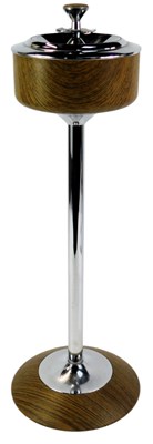 Lot 609 - A mid century teak and chrome floor standing...