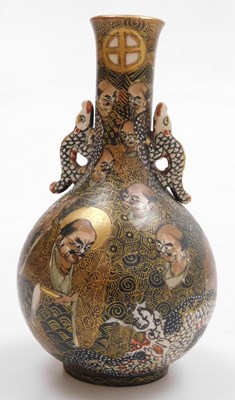 Lot 33 - A Meiji period Satsuma vase, of twin handle,...