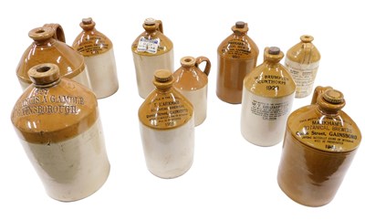 Lot 191 - A quantity of stoneware flagons, stamped with...