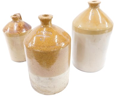 Lot 192 - A large stoneware flagon, stamped AJ Smith...