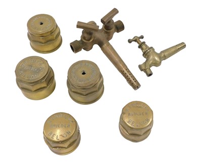 Lot 197 - Four brass cartwheel hubs, stamps to include...