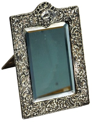Lot 14 - An early 20thC silver mounted mirror, with...