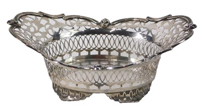 Lot 43 - A George V pierced silver oval basket,...
