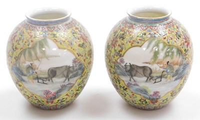 Lot 18 - A pair of 20thC Famille Jaune porcelain vases,...