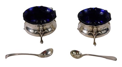Lot 47 - A pair of Edwardian Arts & Crafts silver salts,...