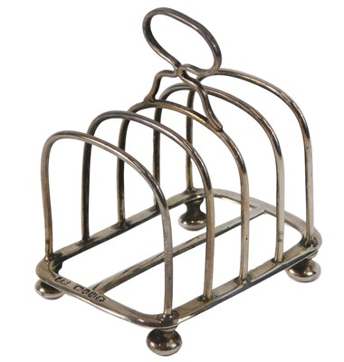 Lot 48 - A Victorian four division silver toast rack,...