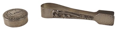 Lot 346 - A pair of Chinese white metal tongs, decorated...