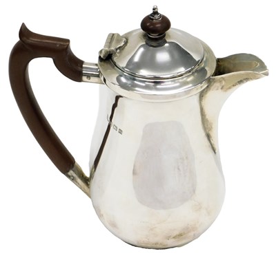 Lot 37 - A George V silver hot water jug, with...