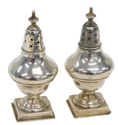 Lot 362 - A pair of Victorian silver pepper pots, each...