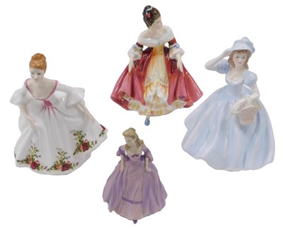 Lot 742 - Two Royal Doulton porcelain figures, modelled...