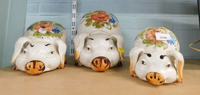 Lot 2006 - A graduated set of three Italian pottery pig...