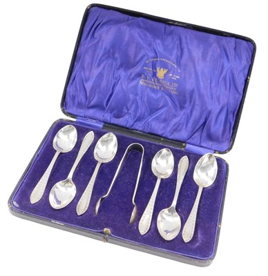 Lot 691 - A set of six George V silver teaspoons, each...