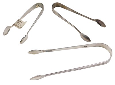 Lot 699 - Three 19thC and later pairs of sugar tongs, to...