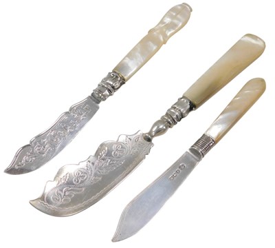 Lot 706 - A Victorian mother of pearl and silver butter...