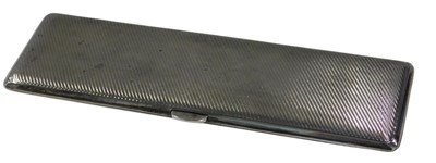 Lot 403 - A narrow George V silver cigarette case, with...