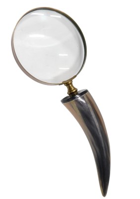 Lot 766 - A brass and simulated horn magnifying glass.