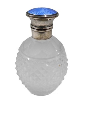 Lot 680 - A cut glass scent bottle, with silver mount,...