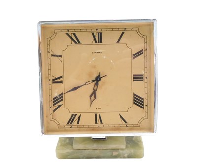 Lot 778 - An Art Deco clock, the dial stamped Garrard...