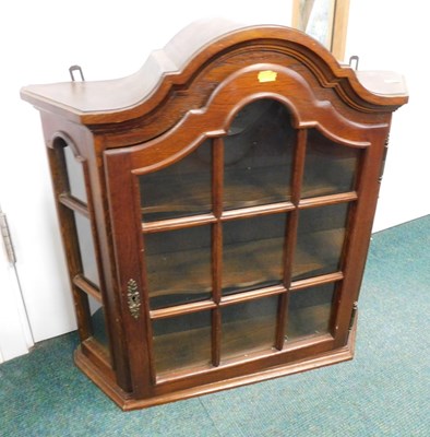 Lot 2035 - An oak wall hanging cabinet, with a panelled...