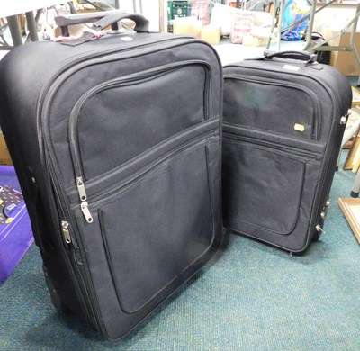 Lot 2074 - Two black canvas suitcases.